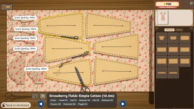 Dressmaker の裁断台。紙の型紙が柄入りの綿生地に並べられ、はさみが置かれている