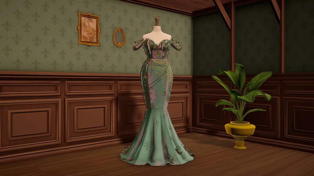 Dressmaker の店内でボディに飾られた完成品の緑のマーメイドドレス